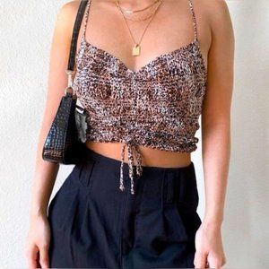 Urban Outfitters animal print top. Adjustable straps, stretchy. Great condition